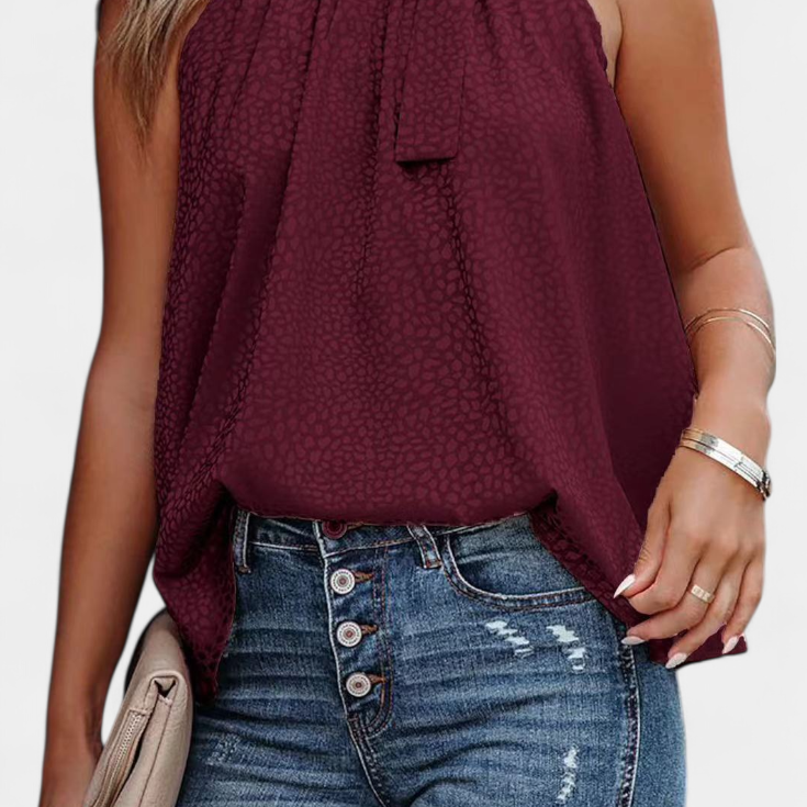 Lady Georgia Sleeveless Leopard Top with High Neck and Bow